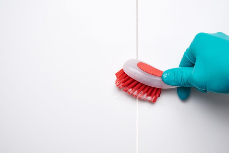 Tile cleaning with a toothbrush