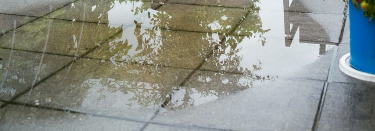 water pooling on tiles of leaking balcony